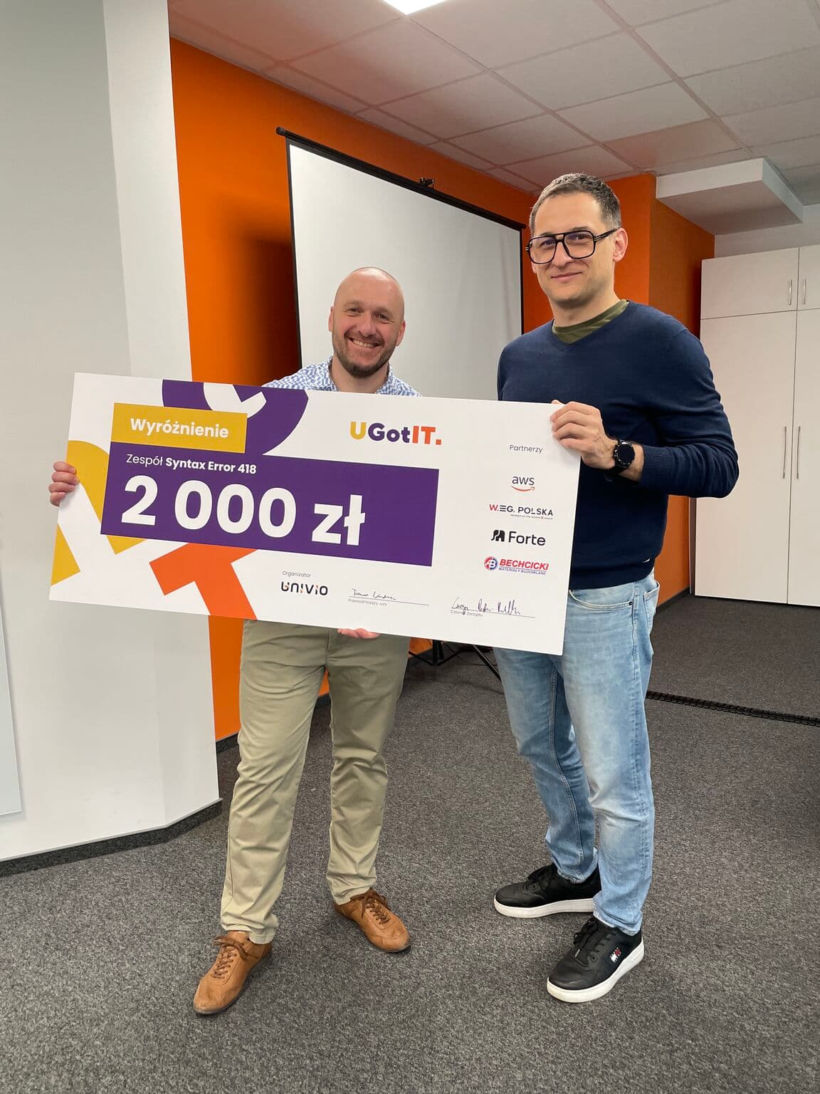Team Syntax Error 418 receiving the UGotIT AI Competition award